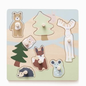 Puzzle en bois à tenons avec des pièces en forme d'arbres et d'animaux